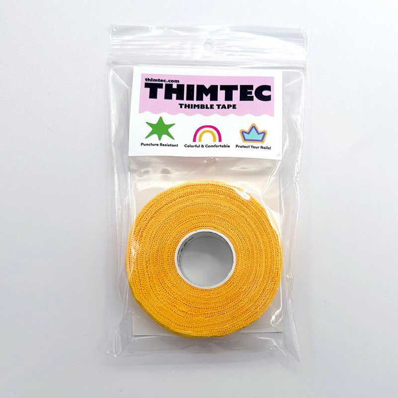 A roll of Bright Yellow Thimtech Thimble Tape in its packaging.