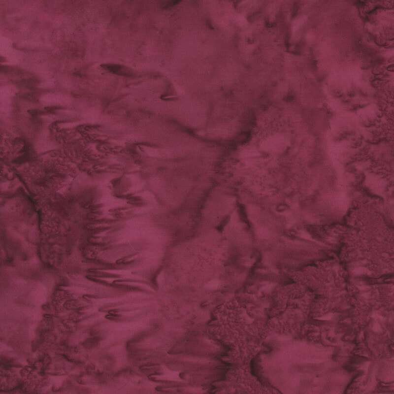 Mottled burgundy batik fabric
