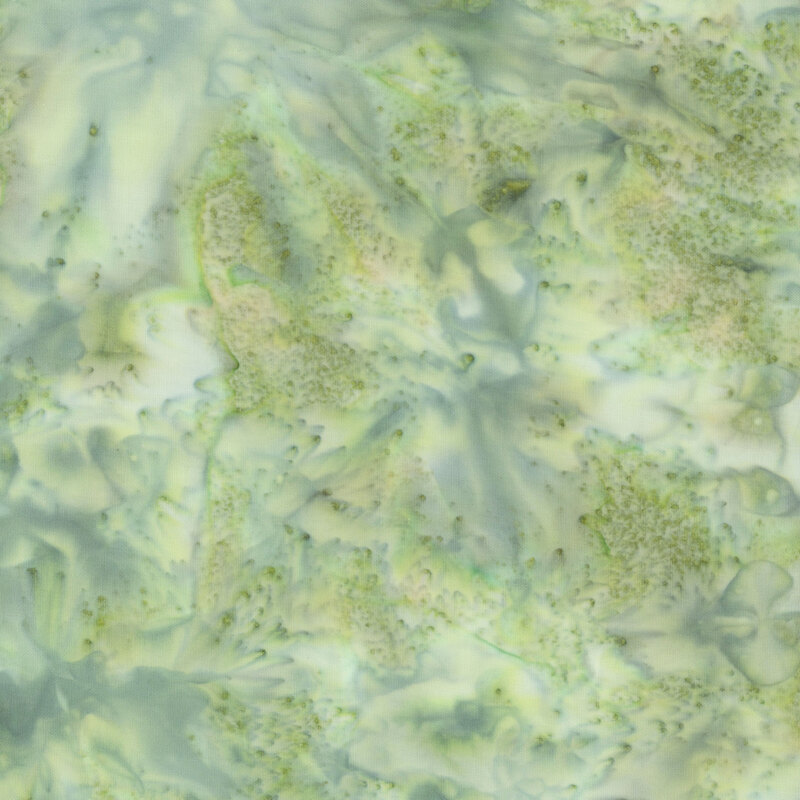 Mottled soft green tonal batik fabric