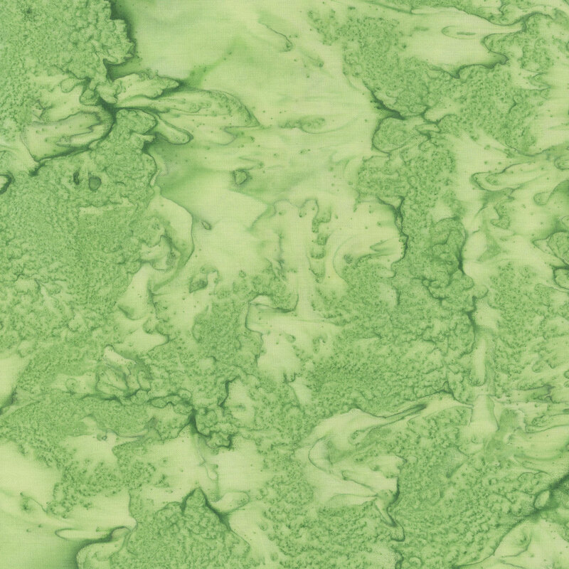 Mottled and tonal leaf green watercolor batik.