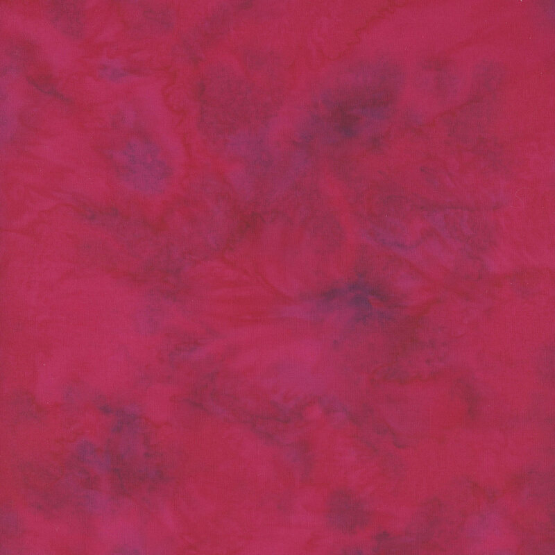 Mottled raspberry red batik fabric