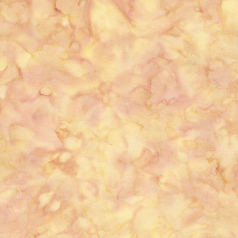 Mottled tan and orange batik fabric