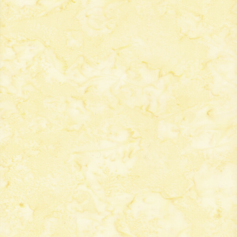 Mottled light yellow tonal batik fabric