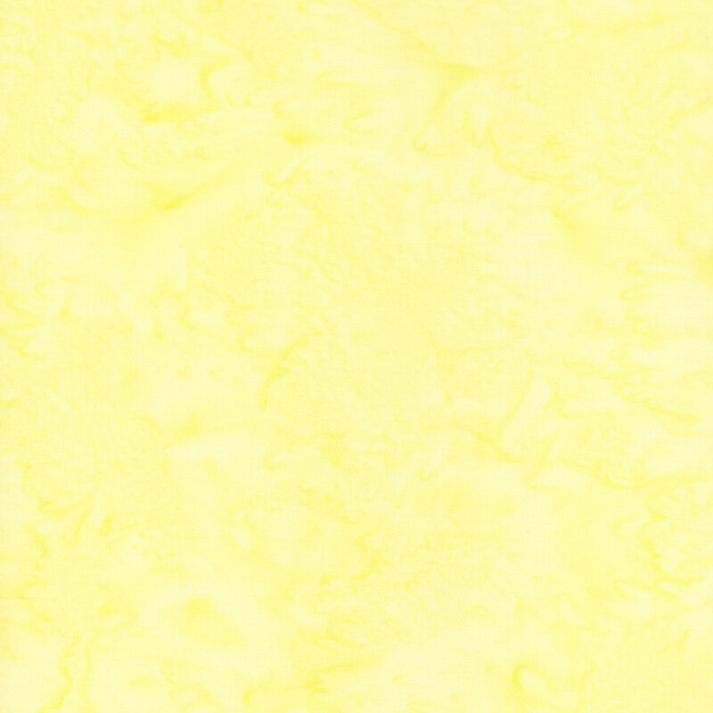 Mottled bright yellow tonal batik fabric