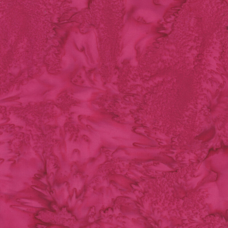 Mottled magenta tonal batik fabric