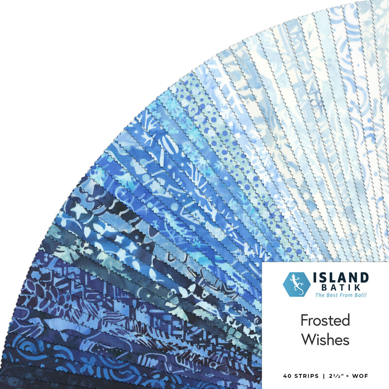 Fanned out collage of fabric in the collection in deep blue, sky blue, ice blue, and white, with wintery motifs