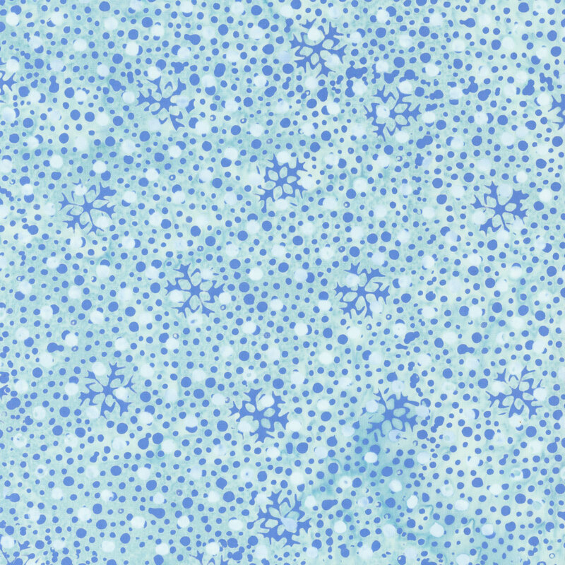 Mottled light aqua fabric with pastel and medium blue dots and snowflakes