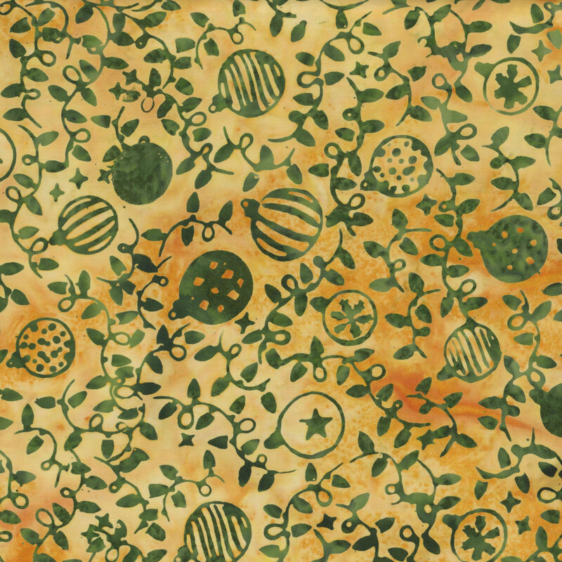 Mottled gold fabric with a pattern of pine green Christmas ornaments and string lights 