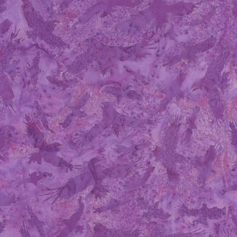 Mottled purple fabric with tonal flying bird silhouettes.