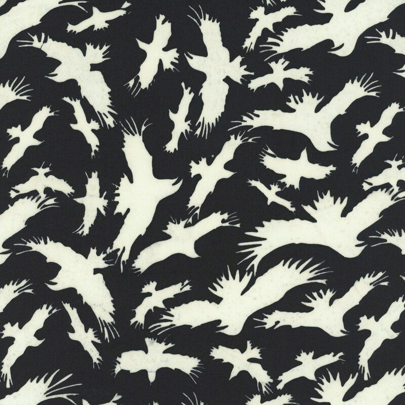 Black fabric featuring a flock of flying birds.
