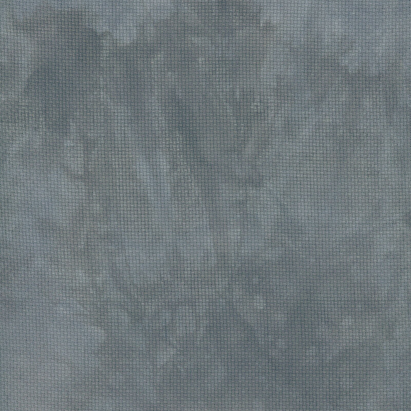 A close up swatch of marbled 14ct aida cloth in a soft back color by Fabric On A Whim.