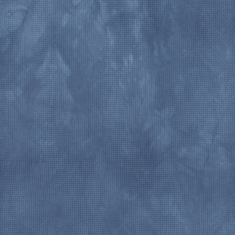 A close up swatch of marbled 14ct aida cloth in a royal blue color by Fabric On A Whim.
