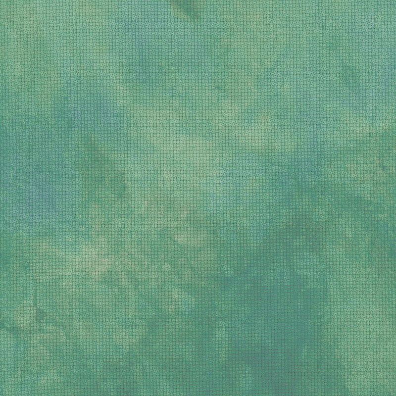 A close up swatch of marbled 14ct aida cloth in a jade green color by Fabric On A Whim.