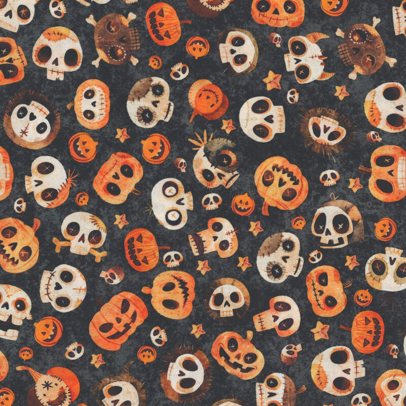 Textured black fabric featuring ghoulish skulls and pumpkins