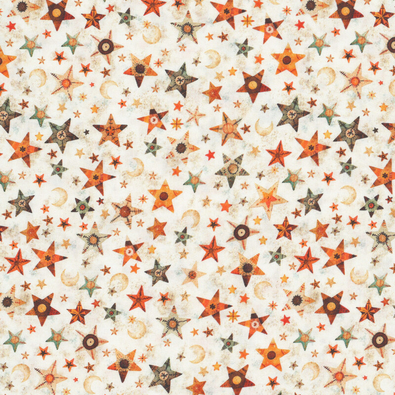 Textured cream fabric tossed with stars and moons.