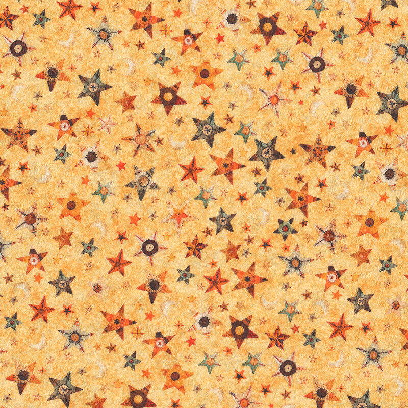 Textured light orange fabric tossed with stars and moons.