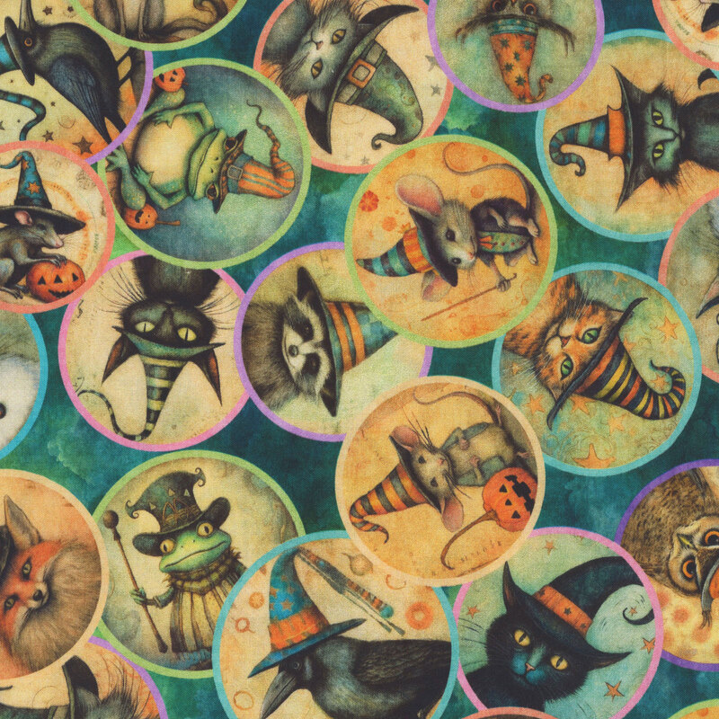 Mottled teal fabric featuring circular medallions of animal familiars dressed in Halloween-themed hats.