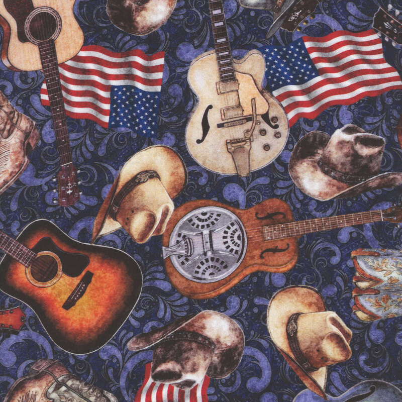 Textured navy blue fabric tossed with a country music motif of cowboy boots, guitars, hats, and American flags.