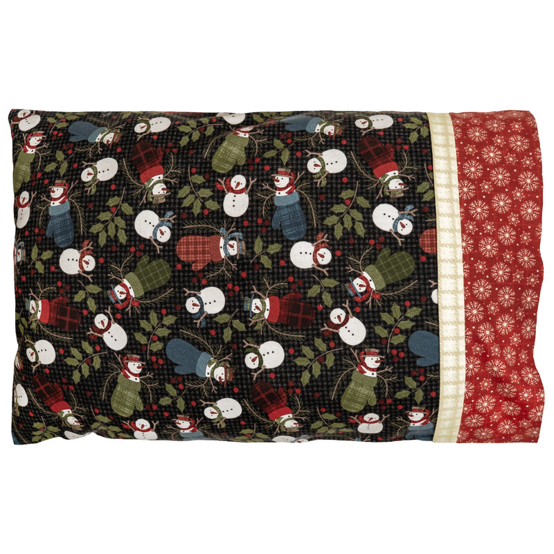 The Magic Pillowcase in black and red snowman fabrics from the Holly Jolly Flannel collection, isolated on a white background.