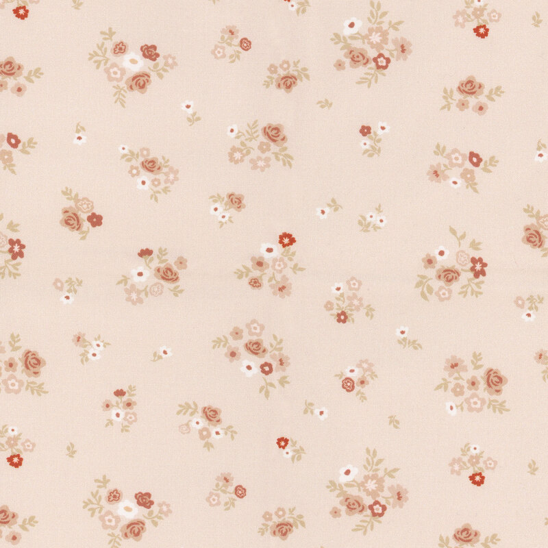 Pale peach fabric featuring bouquets of small flowers and roses.