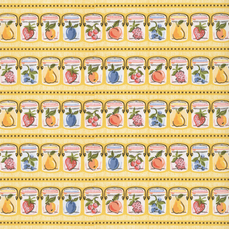 Rows of canning jars holding fresh fruits of the season on mustard yellow fabric.