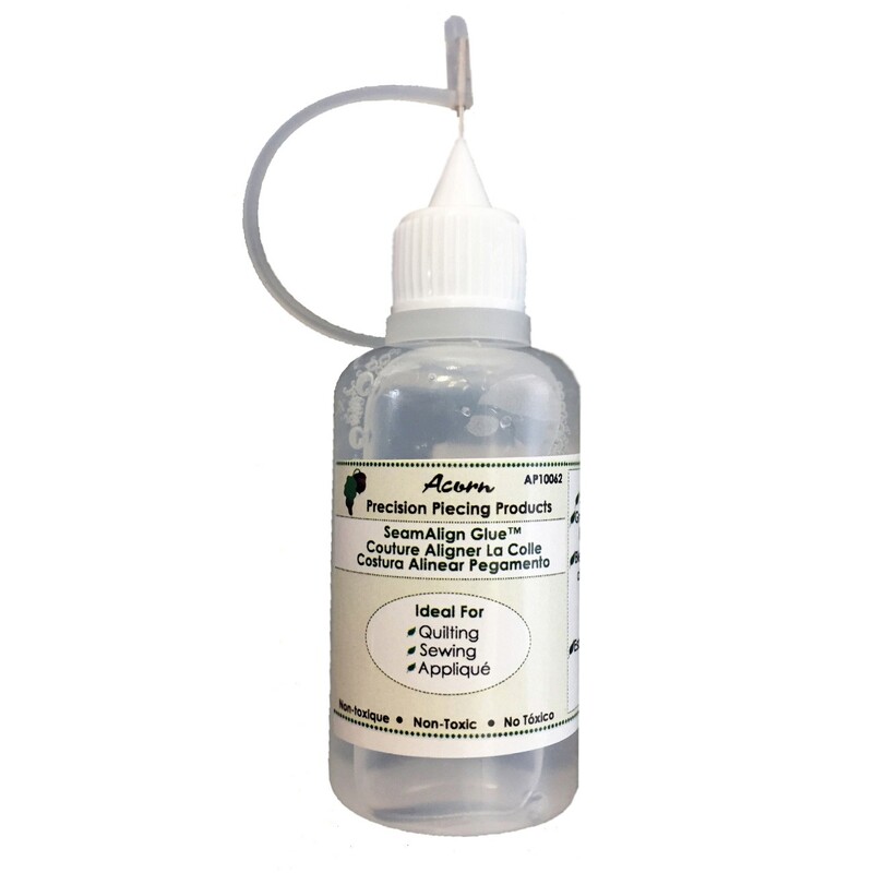 Bottle of Seam Align glue, 1 fl oz, with a neutral design on the label.