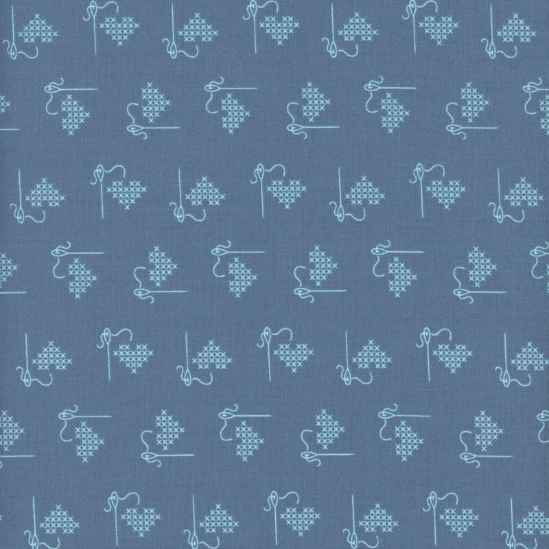 Cobalt blue fabric with tonal ditsy cross-stitched hearts.
