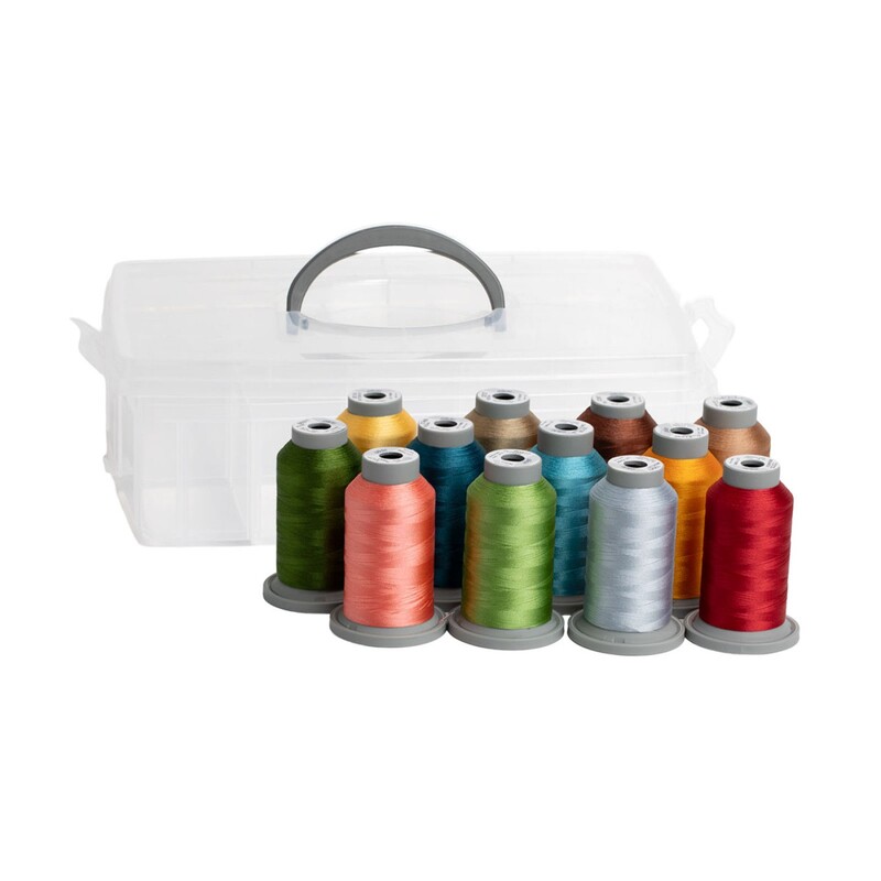 Twelve spools of colorful thread arranged in front of a clear storage box with a handle.