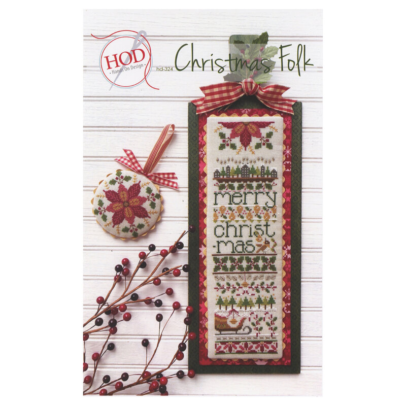 Front of pattern showing the completed cross stitch designs displayed on a white wooden slatted background with coordinating decor.