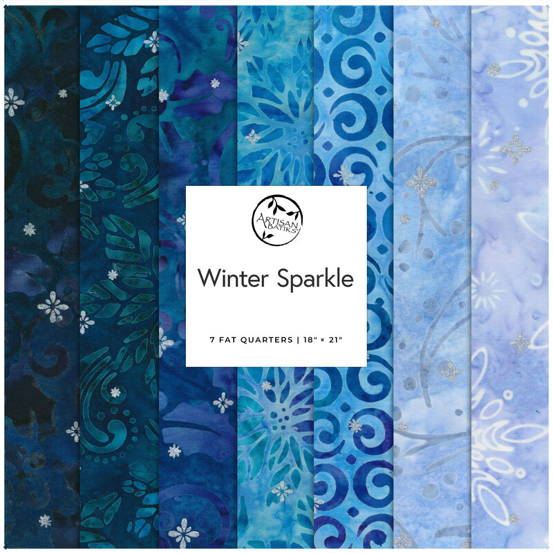 Collage of 7 Winter Sparkle Batik fabrics, in gorgeous shades of blue, teal, and periwinkle.