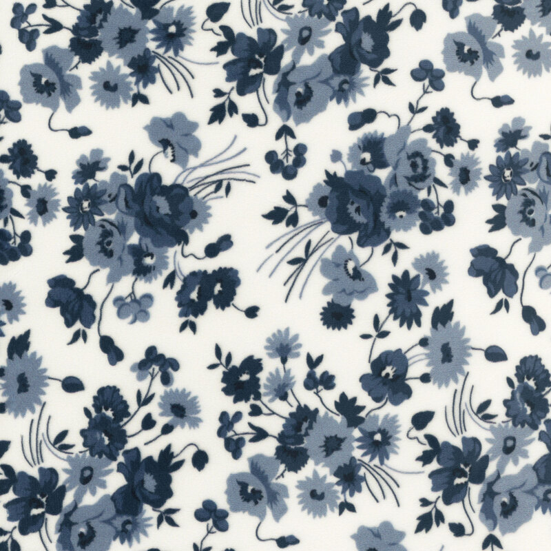 Floral bouquets in shades of navy and cadet blue tossed on a cream background.