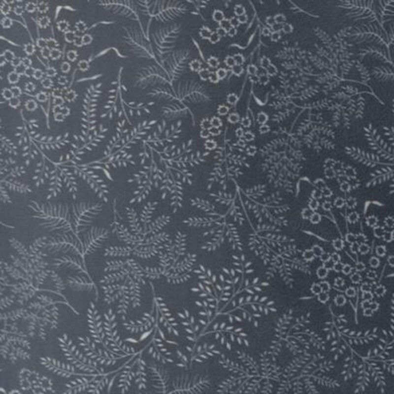 Navy blue fabric featuring a stamped, tonal floral and leaves design.