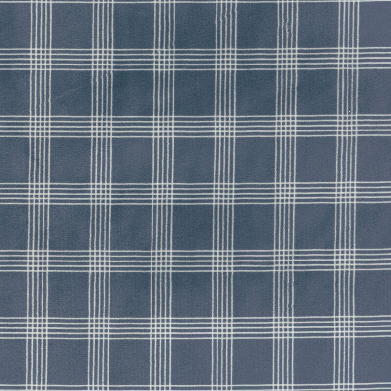 Navy blue fabric featuring a white lined plaid design.