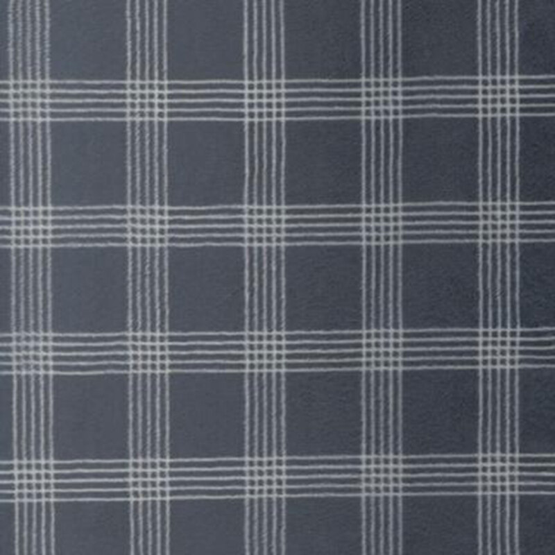 Navy blue fabric featuring a white lined plaid design.