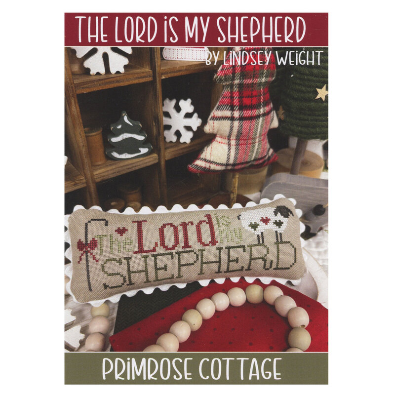 Front of The Lord Is My Shepherd pattern showing the completed design finished into a pillow and staged with coordinating decor.