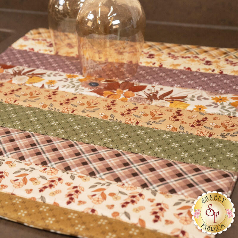 A shot of the drying mat staged with two coordinating wine glasses, demonstrating color and print details.