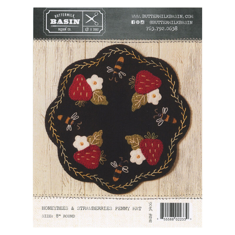 The front of the pattern showing the finished project against a light wood shiplap background