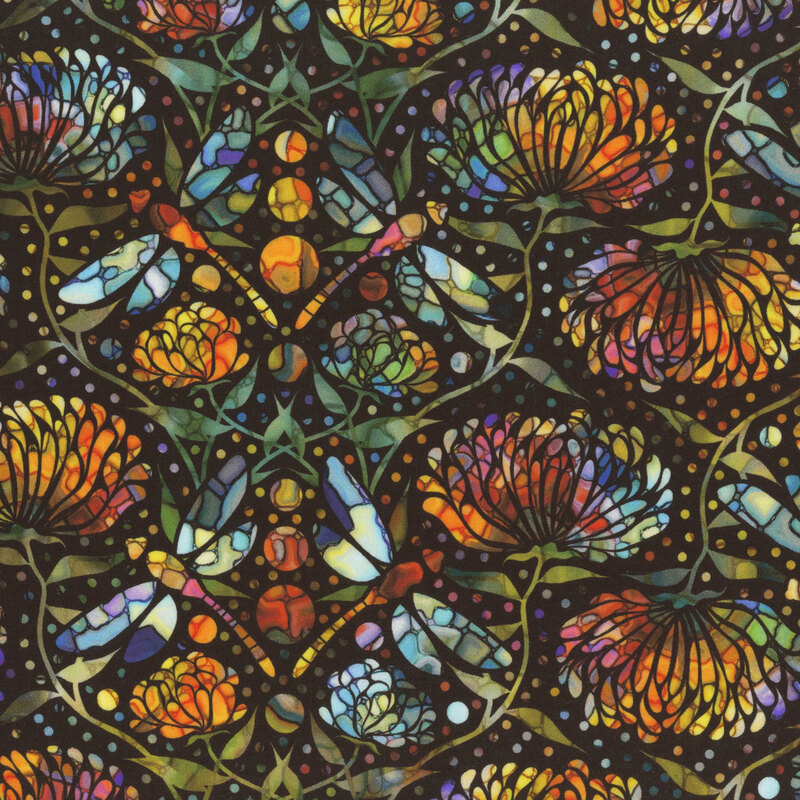 Stained-glass dragonflies and mums in mottled oranges and blues on black fabric.