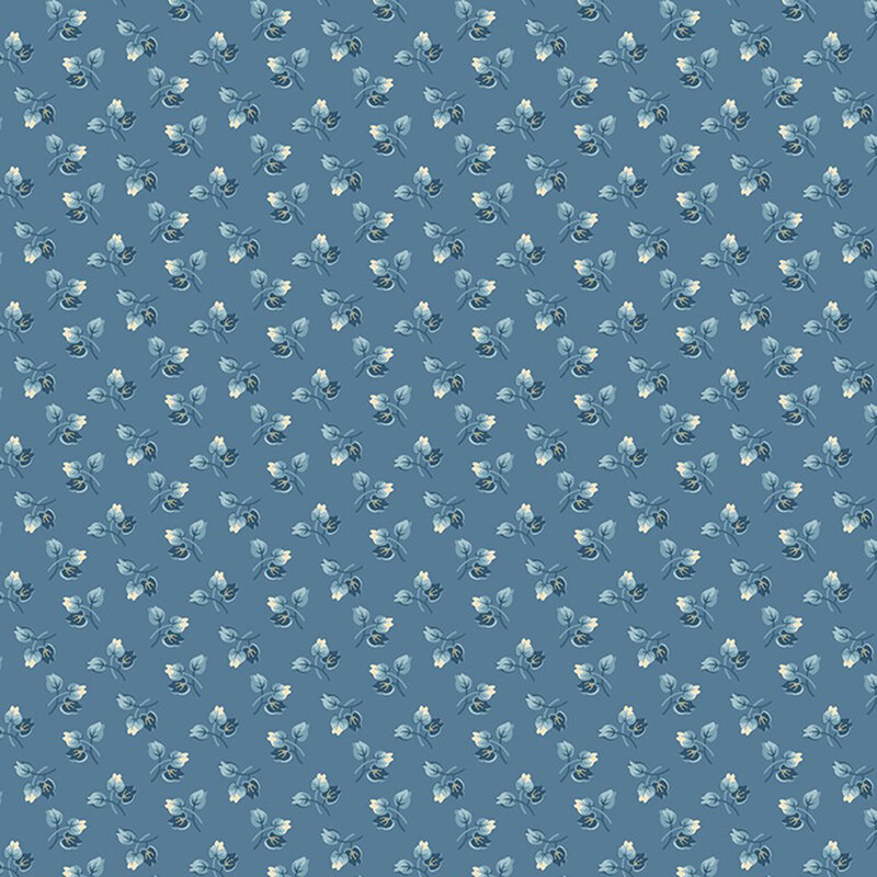 A vintage pattern of small floral buds in navy blue, light blue, and cream on a denim background