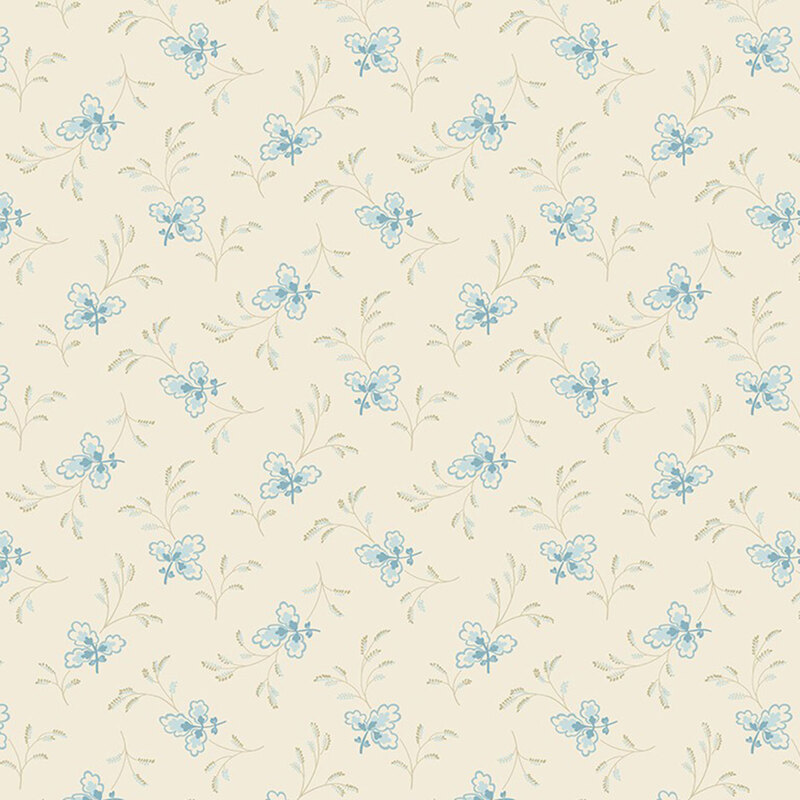 A tossed pattern of stylized blue florals and tan sprigs of grass on a beige background