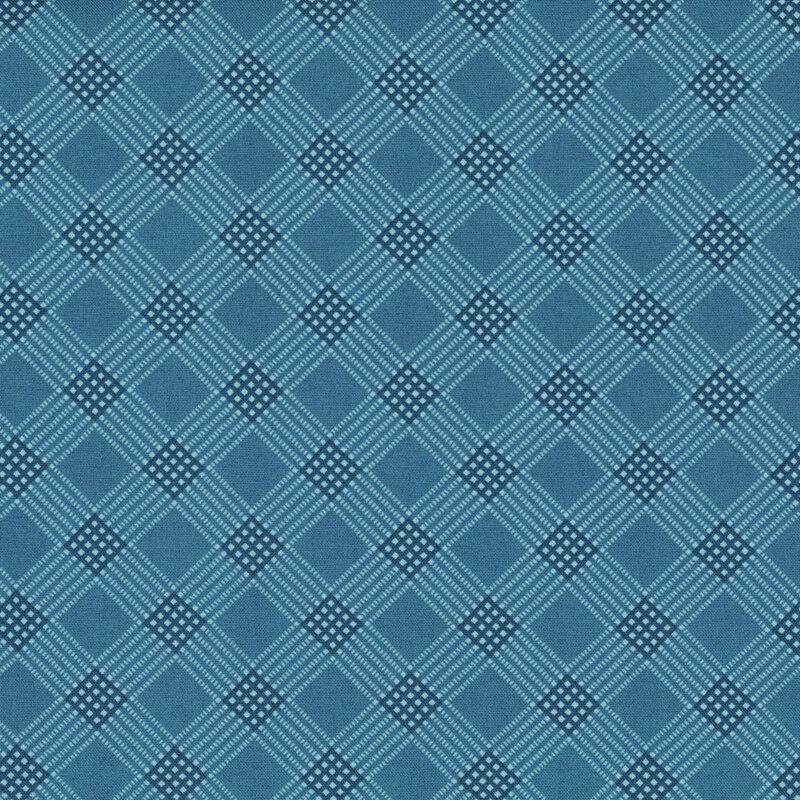 Denim blue fabric with a primitive, diagonal diamond pattern