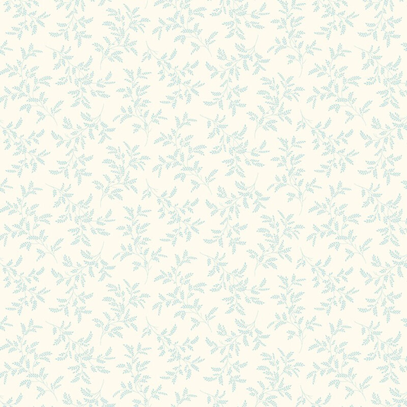 Cream fabric with a tossed pattern of delicate light teal leaves
