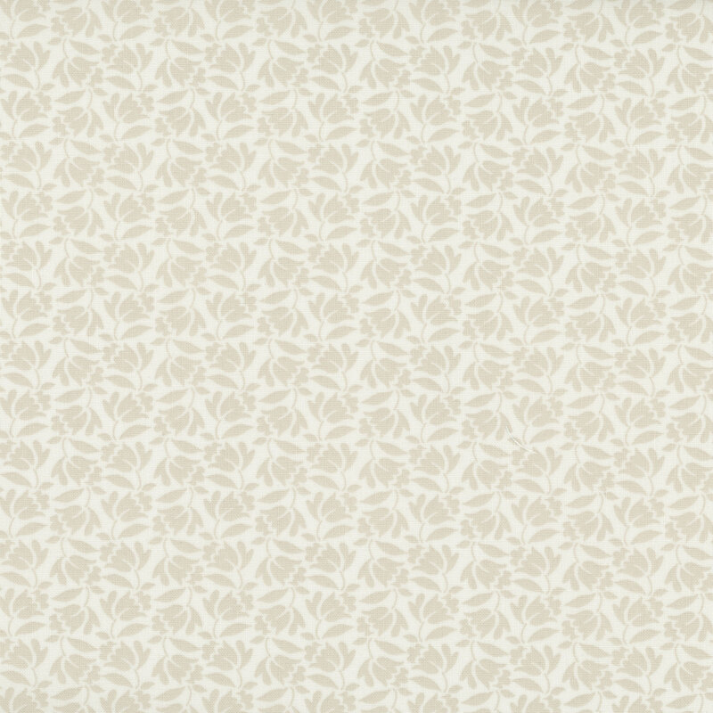 cream fabric with a dense calico pattern of tonal beige flowers