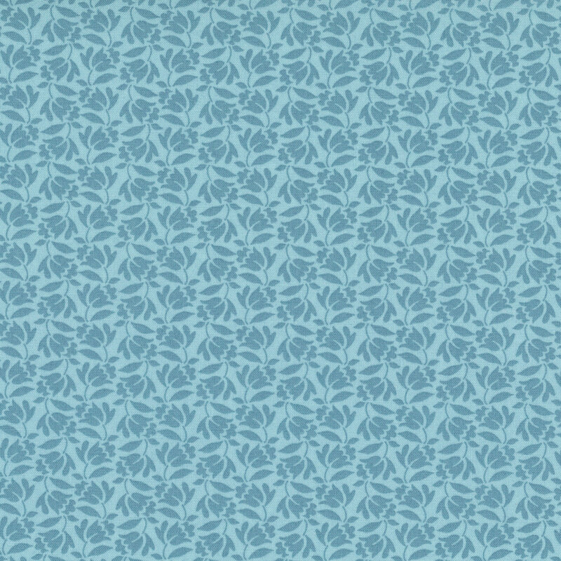 Light Denim blue fabric with a dense calico pattern of medium blue flowers
