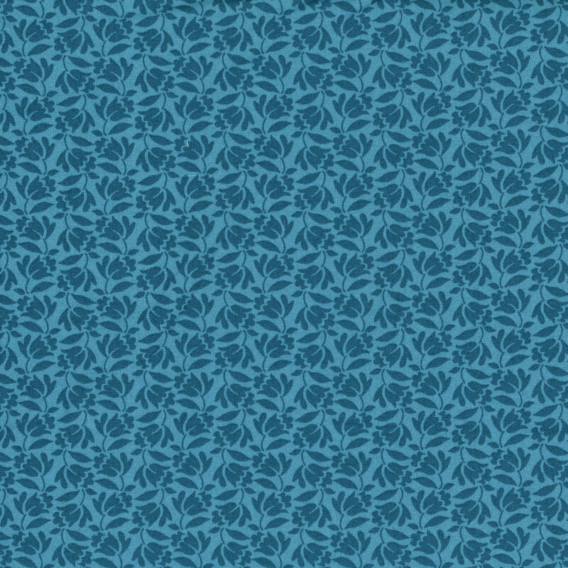lagoon blue fabric with a dense calico pattern of deep indigo flowers
