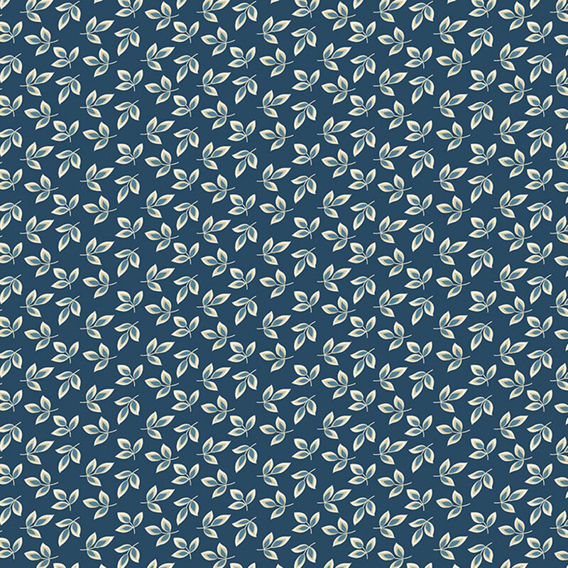 Indigo fabric with a dense pattern of cream and light blue leaves 