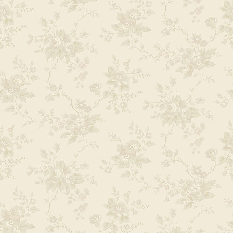 A tonal toile pattern of light beige florals and stems on a cream fabric 