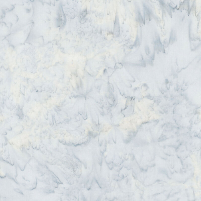 Add vivid color to your creative projects with this mesmerizing, marbled batik fabric in shades of icy gray.