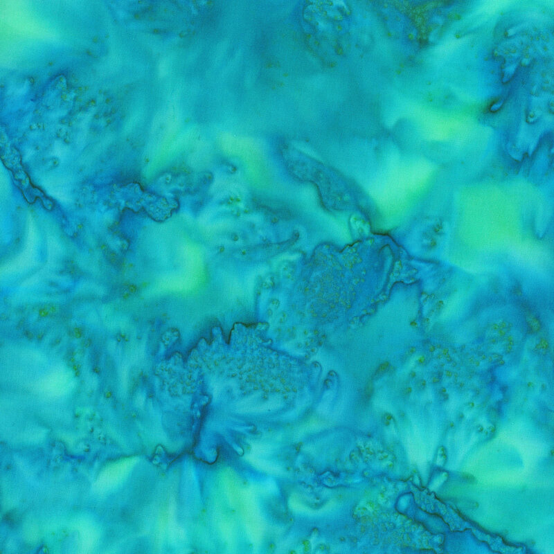 marbled batik fabric in shades of vibrant aqua.