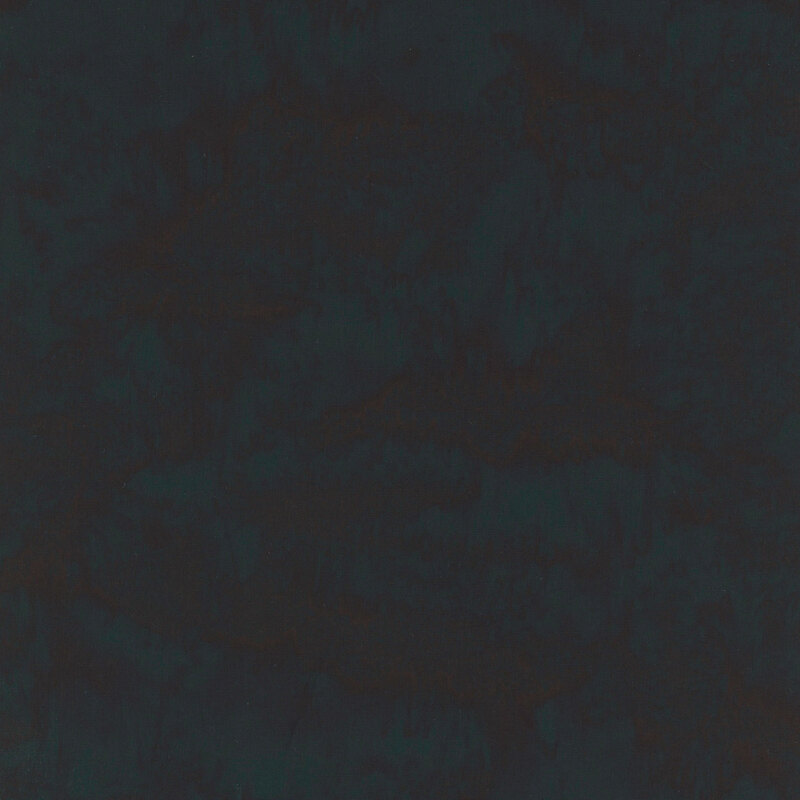 marbled batik fabric in shades of very dark green.